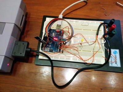 An Arduino Uno board hooked up as a virtual SNES controller.