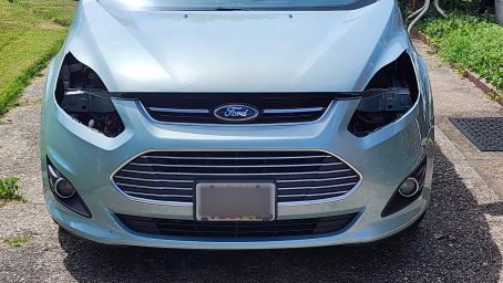 The "blind" car with no headlights installed.