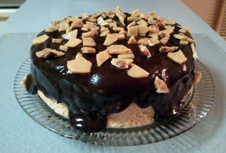 The whole cake done, with peanut brittle topping.