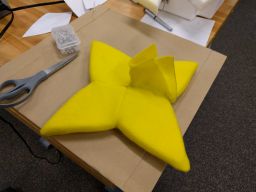 After fit was confirmed, a few last seams were done by machine, leaving the smallest flap open for stuffing the foam through while inverting the felt flower around it.