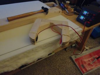 A hot-wire cutter jig, to get the cushion foam cut exactly right.