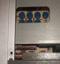 The adjustment knobs on the other side ("outside") of the meter board.