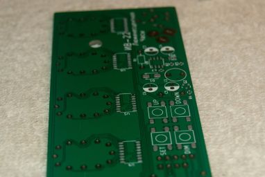 Solder paste applied to the PCB.